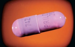 Purple Prilosec capsule pill